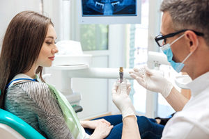 dentist consulting with patient 