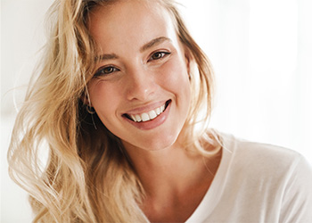 Closeup of woman with blonde hair smiling